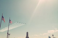 blue angels and american flags