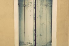 window in yellow building