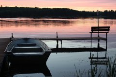 boat and pier sunset