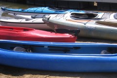 red white blue kayaks