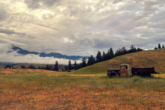 truck with rolling hills and mountain